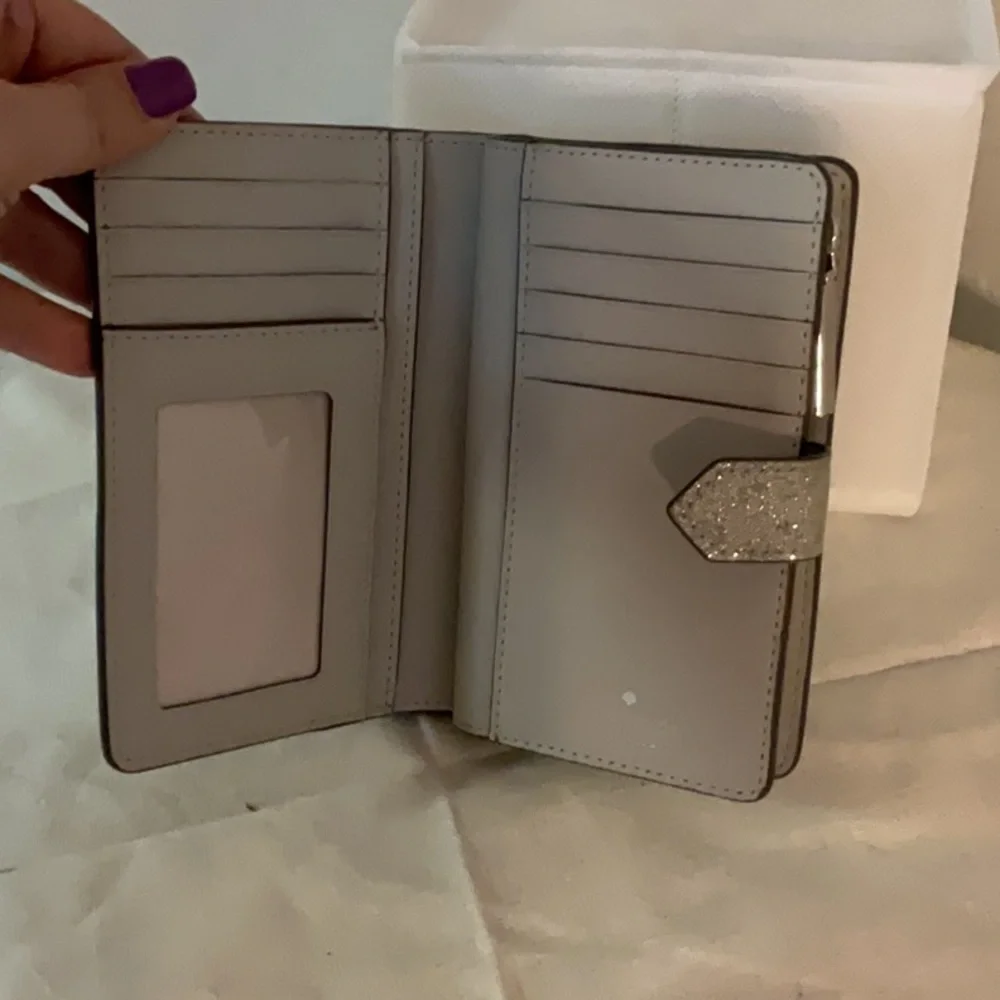 Kate Spade Glimmer Glitter Bifold Wallet, Silver, 5.5”x3.5”x1” - Picture 6 of 12